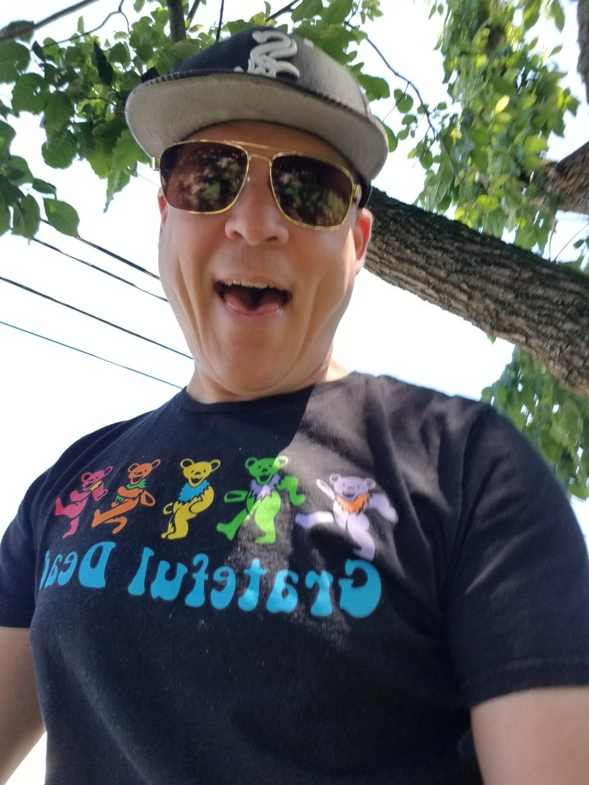 Bam outside in a Grateful Dead t-shirt