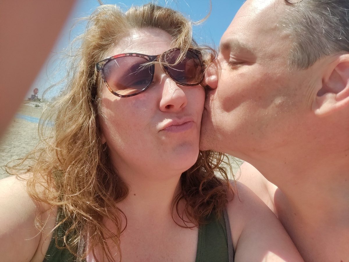 Bam and his wife at the beach