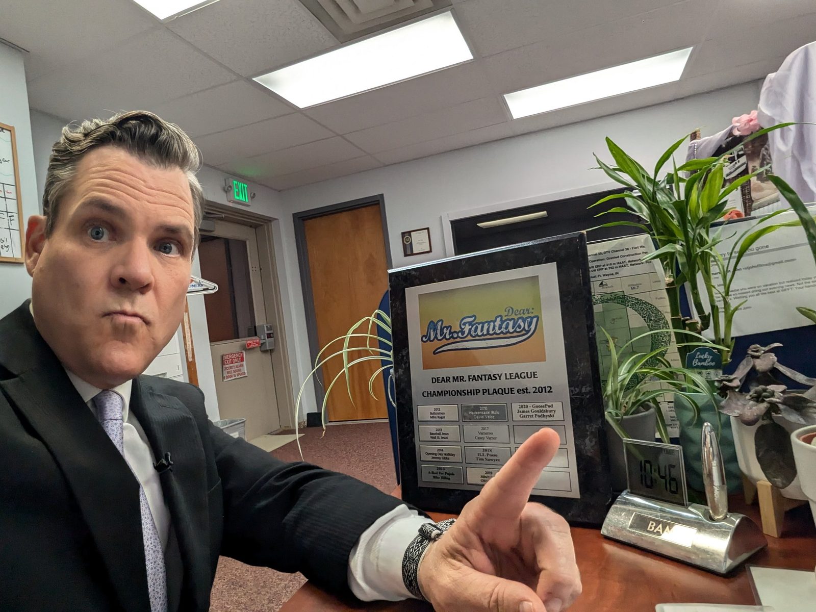 Bam with his fantasy football championship plaque